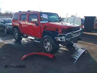 2009 Hummer H3 SUV Alpha with VIN 5GTEN13L398145561, listed as a IAAI auction lot 41232458 with 153,543 mi miles. Bid and sale history available at carsss.com. Image 1.