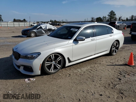 2016 BMW 7 Series 740i with VIN WBA7E2C58GG548314, listed as a Copart auction lot 72876922 with 74,981 mi miles. Bid and sale history available at carsss.com. Image 1.