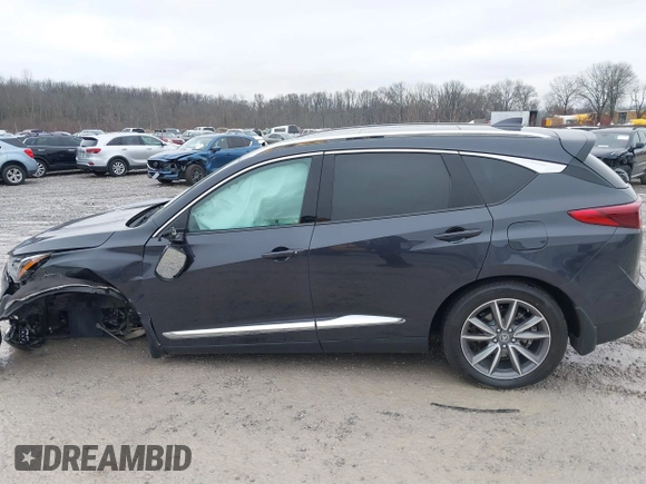 2020 Acura RDX Technology with VIN 5J8TC2H50LL003615, listed as a IAAI auction lot 41427217 with 61,952 mi miles and . Bid and sale history available at DreamBid. Image 14.