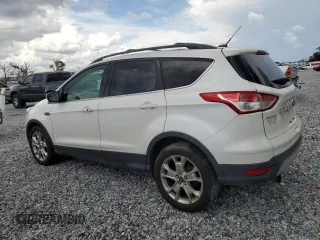 2013 Ford Escape SEL with VIN 1FMCU0HXXDUA70618, listed as a Copart auction lot 65431165 with 200,773 mi miles and Clean title. Bid and sale history available at DreamBid. Image 2.