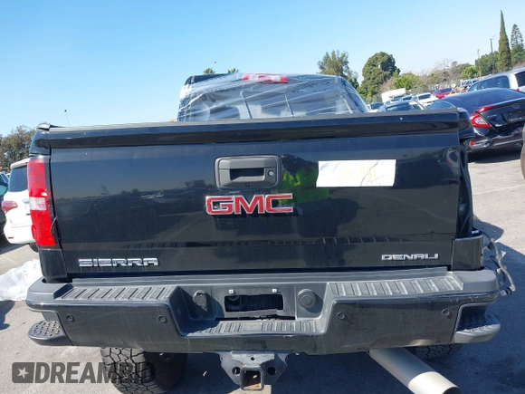 2019 GMC Sierra 2500HD Denali with VIN 1GT12SEYXKF222893, listed as a IAAI auction lot 41722342 with 114,613 mi miles. Bid and sale history available at carsss.com. Image 12.