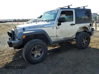 2009 Jeep Wrangler Rubicon with VIN 1J4GA64149L757121, listed as a Copart auction lot 74258934 with 73,241 mi miles and Salvage Title. Bid and sale history available at DreamBid. Image 1.