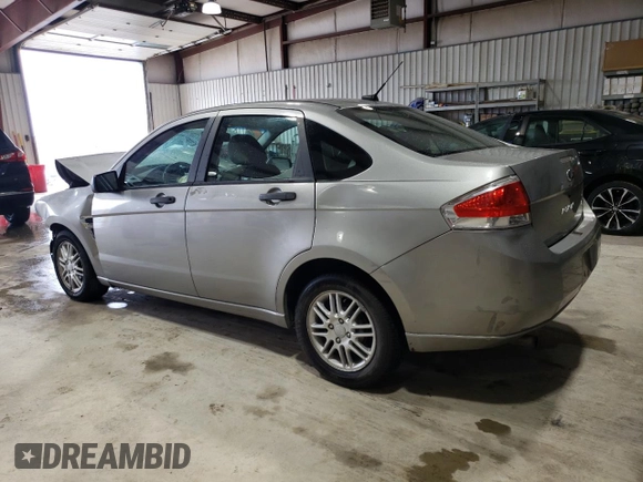 2008 Ford Focus SE with VIN 1FAHP35N68W293258, listed as a Copart auction lot 51770085 with 126,712 mi miles and Salvage Title. Bid and sale history available at carsss.com. Image 2.