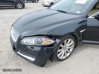 2013 Jaguar XF V6 SC with VIN SAJWJ0EF1D8S81898, listed as a IAAI auction lot 41951634 with 113,697 mi miles. Bid and sale history available at carsss.com. Image 6.