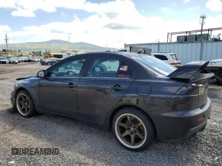 2008 Mitsubishi Lancer Evolution MR with VIN JA3AW56V18U050699, listed as a Copart auction lot 58567274 with 79,267 mi miles and Salvage Title. Bid and sale history available at DreamBid. Image 2.