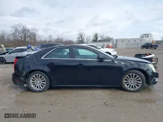 2011 Cadillac CTS Sedan Performance with VIN 1G6DL5ED6B0151304, listed as a IAAI auction lot 41720093 with 197,861 mi miles. Bid and sale history available at carsss.com. Image 13.