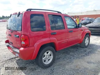 2004 Jeep Liberty Limited with VIN 1J4GK58K94W283166, listed as a IAAI auction lot 42154061 with 206,413 mi miles. Bid and sale history available at carsss.com. Image 4.