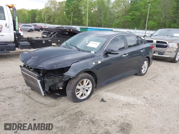 2016 Kia Optima LX with VIN 5XXGT4L38GG023697, listed as a IAAI auction lot 41976461 with 131,023 mi miles. Bid and sale history available at carsss.com. Image 2.