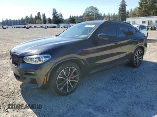 2021 BMW X4 M40i with VIN 5UX2V5C01M9F24036, listed as a Copart auction lot 74834364 with 38,185 mi miles and Salvage Title. Bid and sale history available at carsss.com. Image 1.