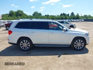 2014 Mercedes-Benz GL 450 with VIN 4JGDF7CE3EA336481, listed as a IAAI auction lot 42647526 with 145,311 mi miles and . Bid and sale history available at DreamBid. Image 13.
