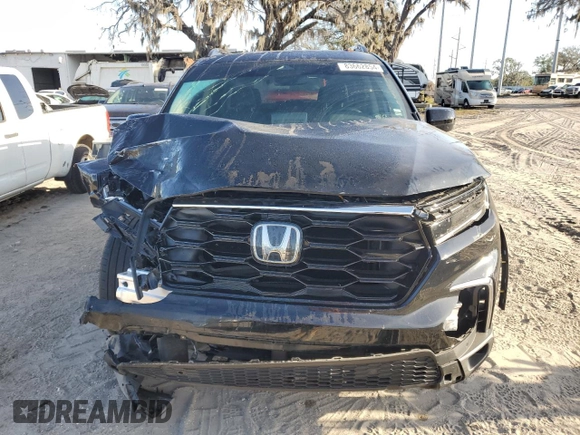 2023 Honda Pilot Touring with VIN 5FNYG2H77PB006594, listed as a Copart auction lot 83662854 with 37,637 mi miles and Salvage Title. Bid and sale history available at DreamBid. Image 5.