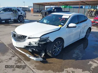 2015 Acura TLX V6 Advance with VIN 19UUB3F7XFA006457, listed as a IAAI auction lot 41969272 with 99,715 mi miles. Bid and sale history available at carsss.com. Image 2.
