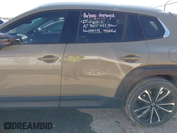 2024 Mazda CX-50 Premium z VIN 7MMVABDYXRN229669, wystawiony jako IAAI lot #41999385 z przebiegiem 10 882 mil mil oraz . Historia ofert i sprzedaży dostępna na DreamBid. Obrazek 14.
