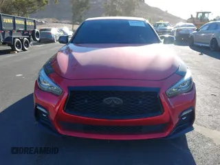 2021 Infiniti Q50 Red Sport 400 with VIN JN1FV7DP3MM850783, listed as a IAAI auction lot 41335175 with 59,113 mi miles and . Bid and sale history available at DreamBid. Image 13.