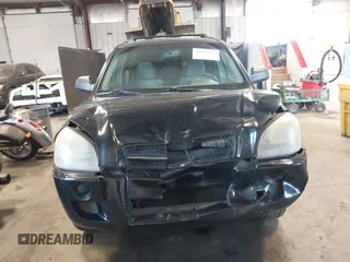 2006 Hyundai Tucson GL with VIN KM8JM12B96U252484, listed as a IAAI auction lot 42100855 with 273,655 mi miles. Bid and sale history available at carsss.com. Image 12.