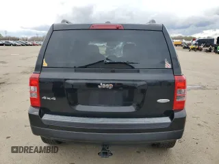 2014 Jeep Patriot Latitude with VIN 1C4NJRFB4ED689363, listed as a Copart auction lot 51185125 with 132,340 mi miles and Salvage Title. Bid and sale history available at carsss.com. Image 6.