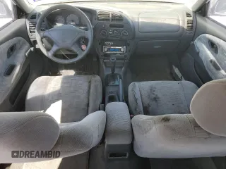 1998 Mitsubishi Mirage DE z VIN JA3AY26A1WU025398, wystawiony jako Copart lot #52533075 z przebiegiem 111 206 mil mil oraz Szkoda całkowita • Salvage title. Historia ofert i sprzedaży dostępna na DreamBid. Obrazek 8.