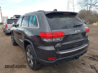 2014 Jeep Grand Cherokee Limited with VIN 1C4RJFBG3EC534827, listed as a IAAI auction lot 41907916 with 138,811 mi miles and . Bid and sale history available at DreamBid. Image 3.