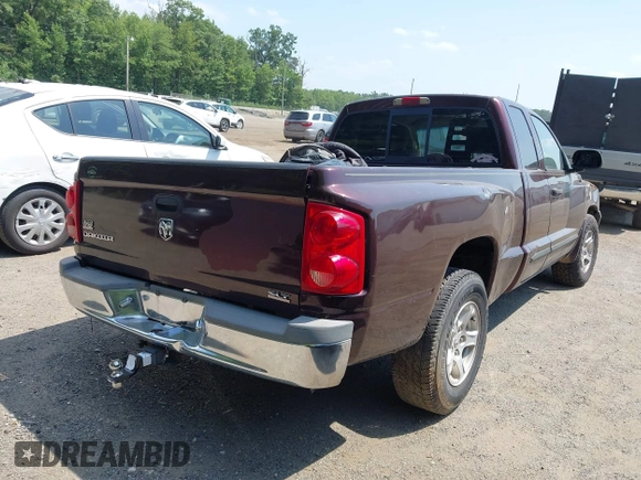 2005 Dodge Dakota SLT with VIN 1D7HE42N05S193871, listed as a IAAI auction lot 42587320 with 130,122 mi miles and . Bid and sale history available at DreamBid. Image 4.