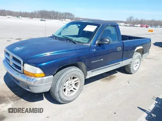 2001 Dodge Dakota with VIN 1B7FL26X41S182146, listed as a IAAI auction lot 41802021 with 202,073 mi miles. Bid and sale history available at carsss.com. Image 2.