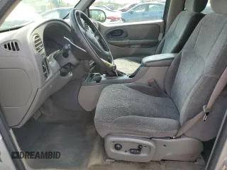 2004 Chevrolet TrailBlazer LS with VIN 1GNDT13SX42330807, listed as a Copart auction lot 55117785 with 178,580 mi miles and Salvage Title. Bid and sale history available at DreamBid. Image 7.