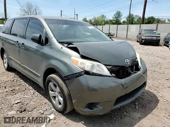 2012 Toyota Sienna z VIN 5TDKA3DCXCS010810, wystawiony jako Copart lot #54872735 z przebiegiem 188 973 mil mil oraz Szkoda całkowita • Salvage title. Historia ofert i sprzedaży dostępna na DreamBid. Obrazek 15.
