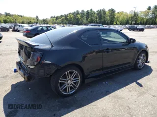 2011 Scion tC z VIN JTKJF5C70B3016542, wystawiony jako Copart lot #55829715 z przebiegiem 99 791 mil mil oraz Szkoda całkowita • Salvage title. Historia ofert i sprzedaży dostępna na DreamBid. Obrazek 3.