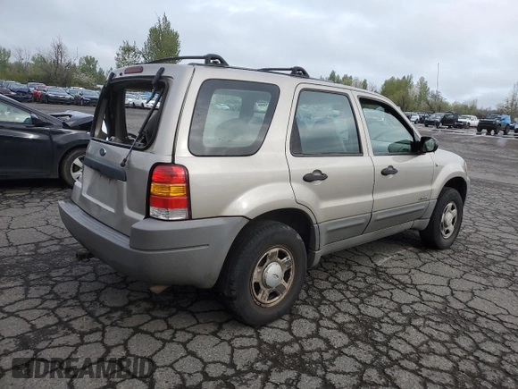 2001 Ford Escape XLS with VIN 1FMYU02111KA37010, listed as a Copart auction lot 52328415 with 312,425 mi miles and Salvage title. Bid and sale history available at DreamBid. Image 3.