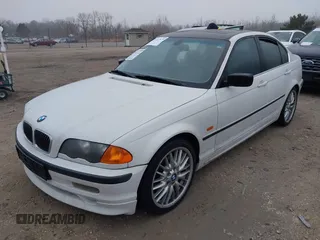 2000 BMW 3 Series 328i with VIN WBAAM5341YFR20178, listed as a IAAI auction lot 41477979 with 151,328 mi miles. Bid and sale history available at carsss.com. Image 2.