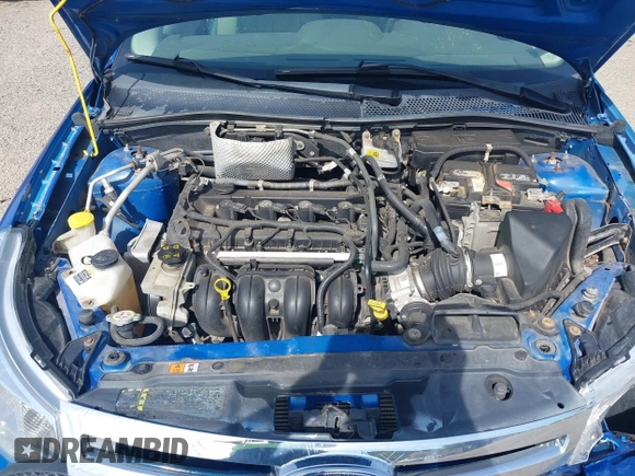 2010 Ford Focus SE with VIN 1FAHP3FNXAW159048, listed as a IAAI auction lot 42103062 with 142,810 mi miles. Bid and sale history available at carsss.com. Image 10.