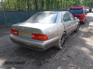1995 Lexus LS 400 z VIN JT8UF22E9S0018339, wystawiony jako IAAI lot #42289526 z przebiegiem 225 642 mil mil oraz . Historia ofert i sprzedaży dostępna na DreamBid. Obrazek 4.