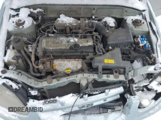 2005 Hyundai Accent GLS with VIN KMHCG45C05U605523, listed as a Copart auction lot 43811815 with 190,638 mi miles and Salvage Title. Bid and sale history available at carsss.com. Image 11.
