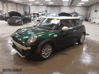 2015 MINI Cooper Hardtop S with VIN WMWXP7C57F2A39384, listed as a IAAI auction lot 41733215 with 60,750 mi miles. Bid and sale history available at carsss.com. Image 18.