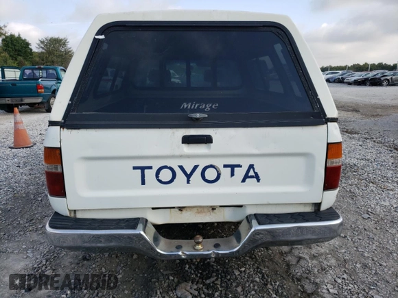 1993 Toyota Pickup DLX z VIN JT4RN93P7P5074129, wystawiony jako Copart lot #72893054 z przebiegiem 235 053 mil mil oraz Szkoda całkowita • Salvage title. Historia ofert i sprzedaży dostępna na DreamBid. Obrazek 6.