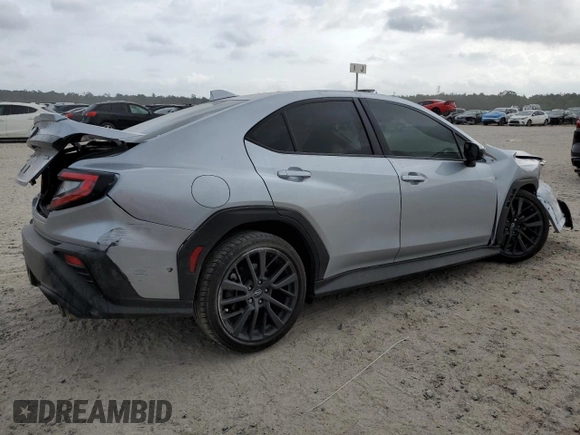2024 Subaru WRX Premium with VIN JF1VBAH64R9808221, listed as a Copart auction lot 54990545 with 105,565 mi miles and Salvage title. Bid and sale history available at DreamBid. Image 3.