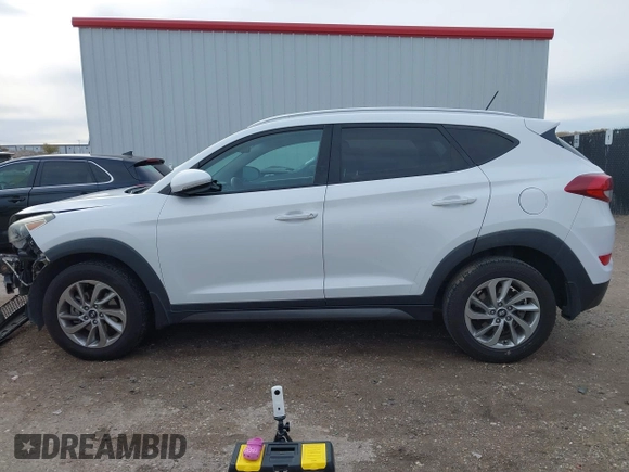 2016 Hyundai Tucson Sport with VIN KM8J33A2XGU242256, listed as a IAAI auction lot 41065573 with 97,503 mi miles. Bid and sale history available at carsss.com. Image 15.