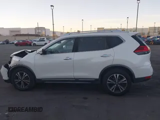 2017 Nissan Rogue SL with VIN JN8AT2MT6HW154527, listed as a IAAI auction lot 41808881 with 64,982 mi miles and . Bid and sale history available at DreamBid. Image 14.