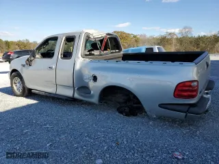 2003 Ford F-150 XL with VIN 1FTRX07W03KB17955, listed as a Copart auction lot 83061424 with 164,529 mi miles and Salvage Title. Bid and sale history available at carsss.com. Image 2.