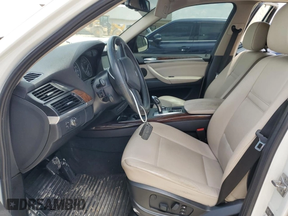 2012 BMW X5 35i с VIN 5UXZV4C58CL987049, выставлен на аукционе Copart как лот 61013925 с пробегом 167 508 миль миль и Чистый • Clean title. История ставок и продаж доступна на DreamBid. Изображение 7.