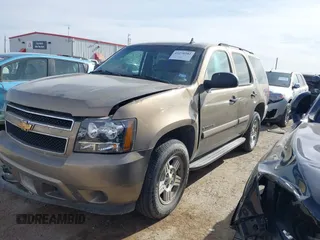 2007 Chevrolet Tahoe LTZ z VIN 1GNFC130X7R241919, wystawiony jako IAAI lot #41270202 z przebiegiem Nie podano mil oraz . Historia ofert i sprzedaży dostępna na DreamBid. Obrazek 14.