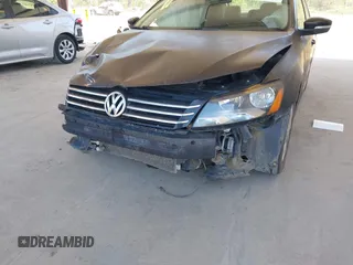 2015 Volkswagen Passat 1.8T Limited Edition with VIN 1VWAT7A36FC054484, listed as a IAAI auction lot 42078125 with 119,550 mi miles. Bid and sale history available at carsss.com. Image 6.
