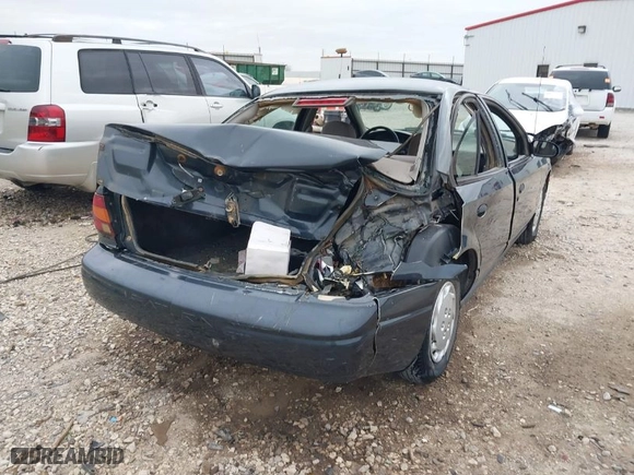 2002 Saturn SL with VIN 1G8ZH52852Z270057, listed as a IAAI auction lot 41816011 with 314,884 mi miles. Bid and sale history available at carsss.com. Image 4.
