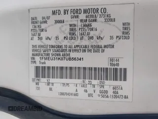 2007 Ford Explorer Sport Trac XLT z VIN 1FMEU31K07UB56341, wystawiony jako IAAI lot #42646998 z przebiegiem 132 347 mil mil oraz . Historia ofert i sprzedaży dostępna na DreamBid. Obrazek 9.