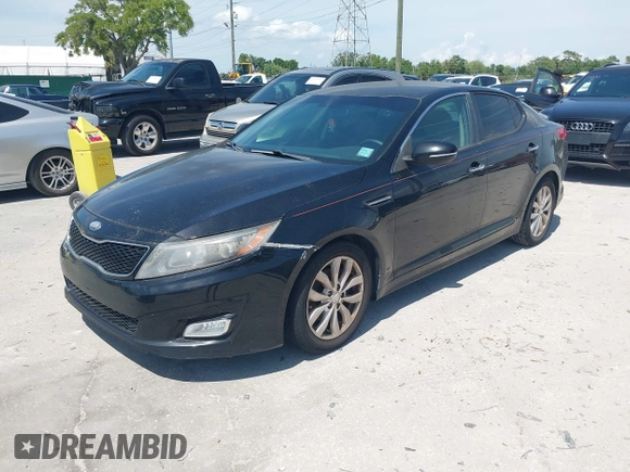 2014 Kia Optima EX with VIN 5XXGN4A72EG294381, listed as a IAAI auction lot 41944473 with 119,781 mi miles and . Bid and sale history available at carsss.com. Image 2.