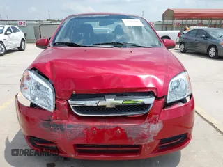 2007 Chevrolet Aveo LS z VIN KL1TD56617B132166, wystawiony jako IAAI lot #42156146 z przebiegiem 190 769 mil mil oraz . Historia ofert i sprzedaży dostępna na DreamBid. Obrazek 13.