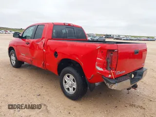2012 Toyota Tundra z VIN 5TFUM5F11CX028307, wystawiony jako IAAI lot #41952532 z przebiegiem 253 254 mil mil oraz . Historia ofert i sprzedaży dostępna na DreamBid. Obrazek 3.