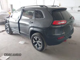 2016 Jeep Cherokee Trailhawk with VIN 1C4PJMBS0GW169184, listed as a IAAI auction lot 42255346 with 152,802 mi miles and . Bid and sale history available at DreamBid. Image 3.