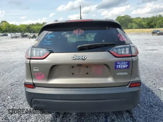 2020 Jeep Cherokee Latitude with VIN 1C4PJLCBXLD556789, listed as a Copart auction lot 58582565 with 66,865 mi miles and Salvage title. Bid and sale history available at DreamBid. Image 6.