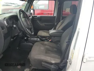 2018 Jeep Wrangler JK Unlimited Sport S with VIN 1C4BJWDG2JL809600, listed as a Copart auction lot 76384474 with 0 mi miles and Non Repairable. Bid and sale history available at carsss.com. Image 7.