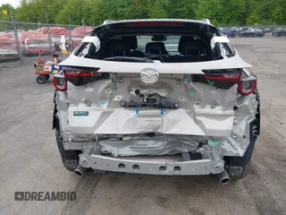 2024 Mazda CX-30 S Select Sport with VIN 3MVDMBBM1RM655178, listed as a IAAI auction lot 42311902 with 3,689 mi miles and . Bid and sale history available at DreamBid. Image 6.